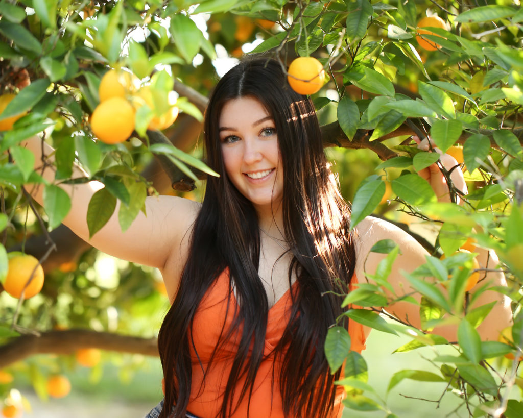 girl in orange grove