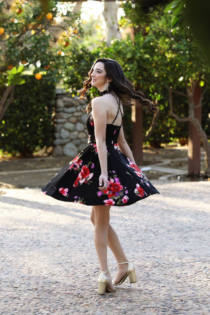 teen in black floral dress for senior phoots