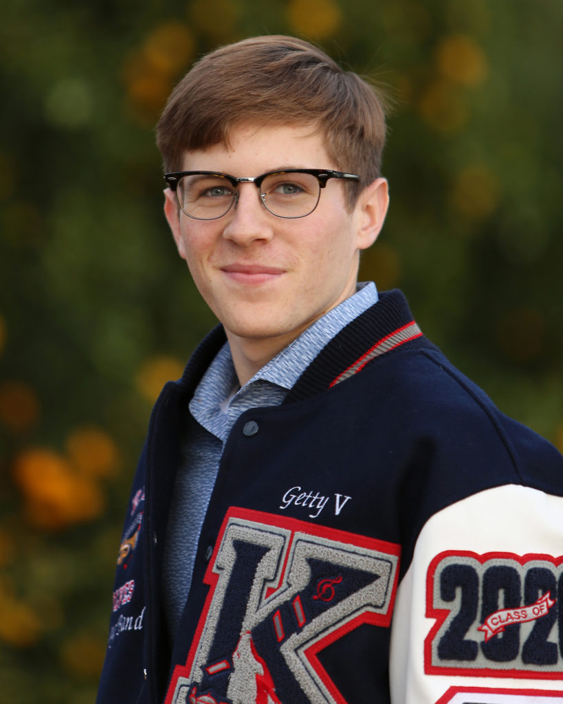 teen guy with glasses