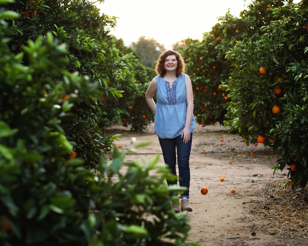 teen in orange grove